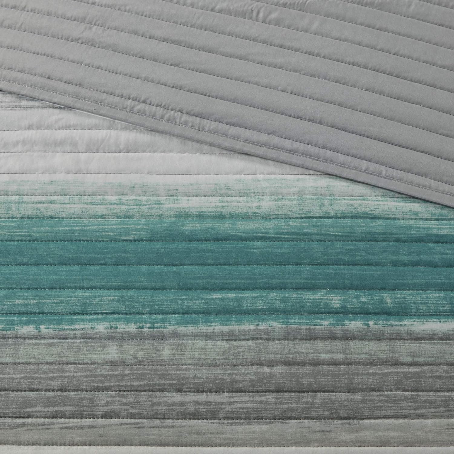 Juego de cama acolchado reversible a rayas en una bolsa de 8 piezas con juego de sábanas y almohada decorativa